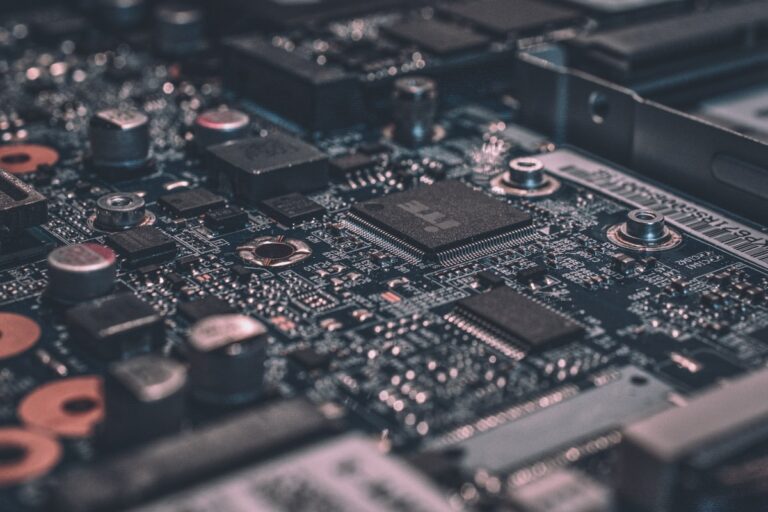 Electronic ankle bracelet technology concept — circuit board and wearable supervision hardware representing 2026 GPS monitoring buyer guide