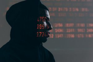 Digital face scan with projected data patterns illustrating biometric facial recognition technology used in smartphone monitoring apps