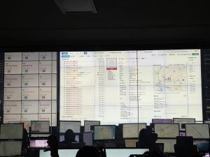 Probation officers at South Korea Ministry of Justice Central Location Tracking Control Center monitoring electronic ankle monitor locations in Seoul