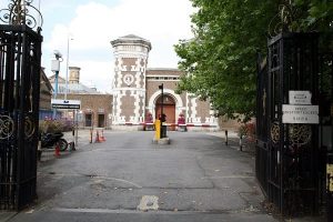 HMP Wormwood Scrubs prison in London - UK government discusses subcutaneous microchip tracking for offenders amid prison overcrowding crisis