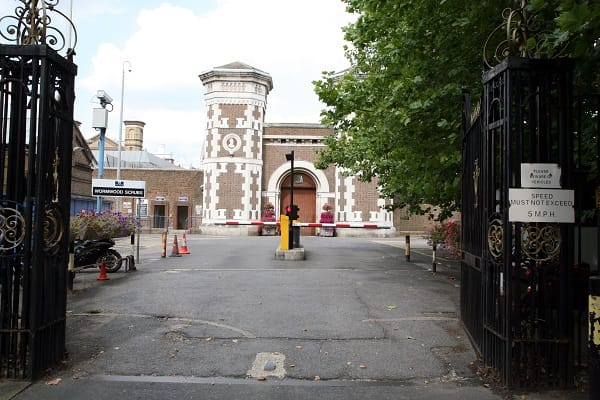HMP Wormwood Scrubs prison in London - UK government discusses subcutaneous microchip tracking for offenders amid prison overcrowding crisis