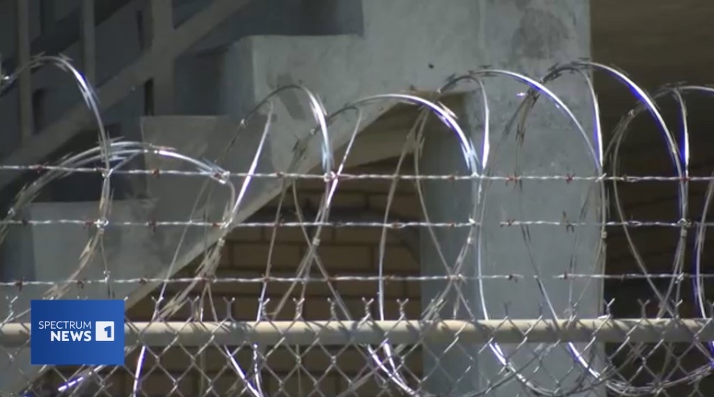 Scotland County Detention Center barbed wire fence - jail overcrowding crisis with 187 inmates in 109-bed facility. Source: Spectrum News 1