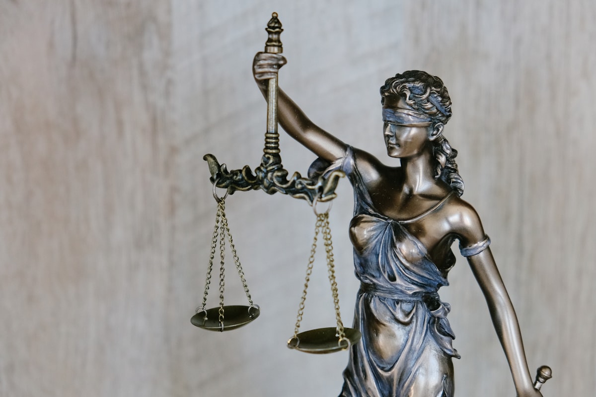 Lady Justice symbolizing the balance between public safety and defendant rights in pretrial risk assessment reform